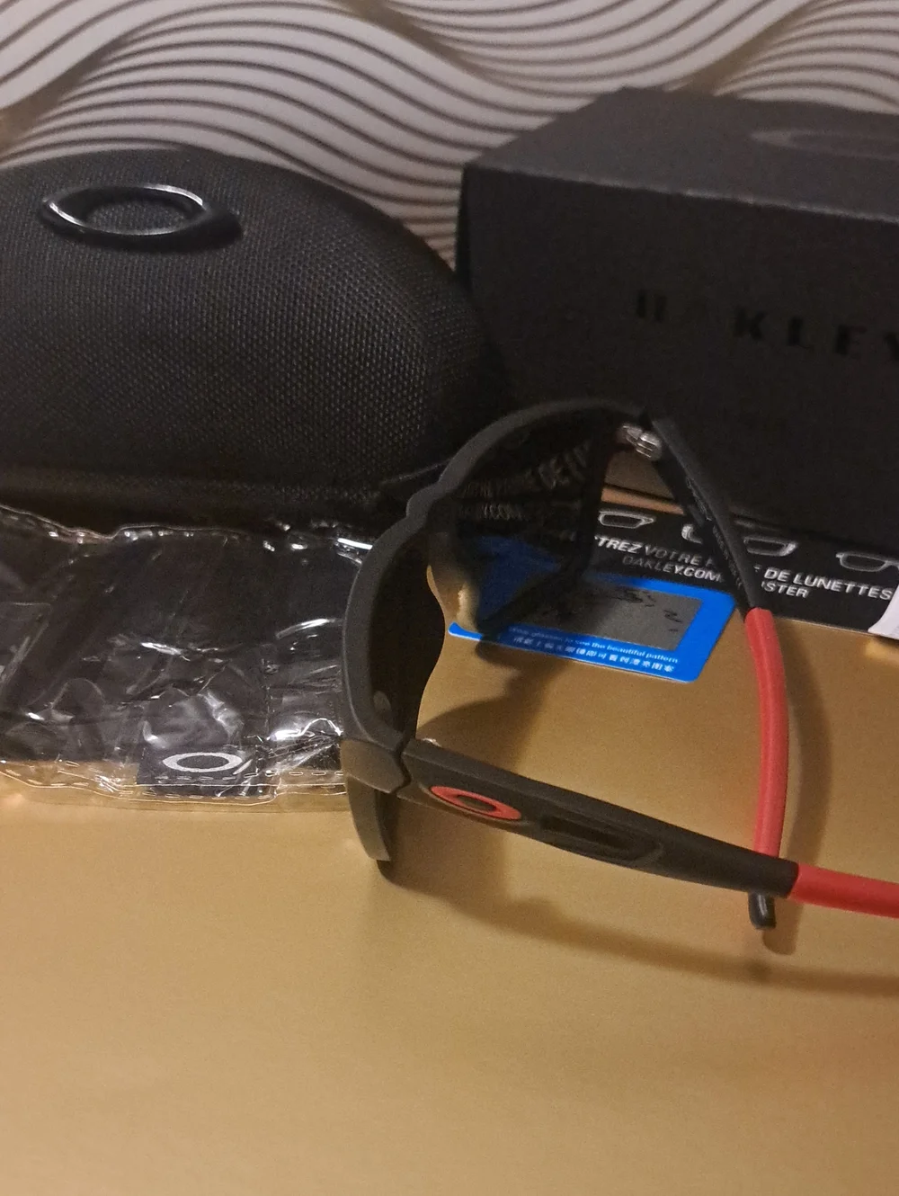 Oakley Men’s Black Frame Sunglasses with Smoke Lenses